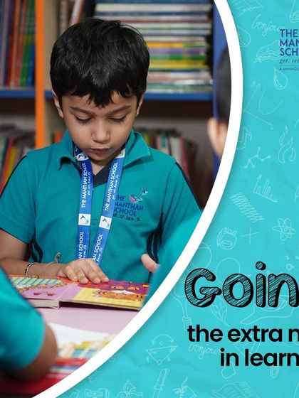 We encourage our students to go the extra mile in their learning. A young boy is absorbed in a book in our library, showcasing the love for reading we cultivate.