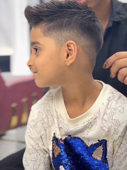 A fresh and clean haircut for this little gentleman. He looks super sharp.