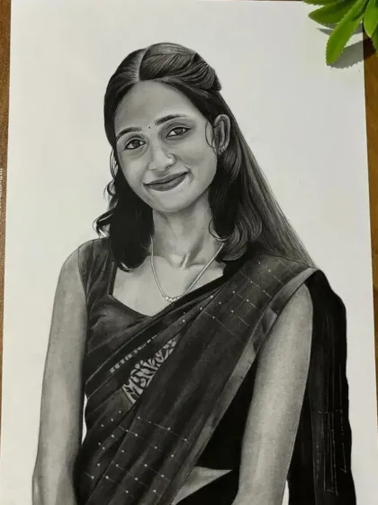This A4 portrait of a woman in a dark saree was a commission from Kerala. The contrast between the dark fabric and her skin tone makes for a striking image.