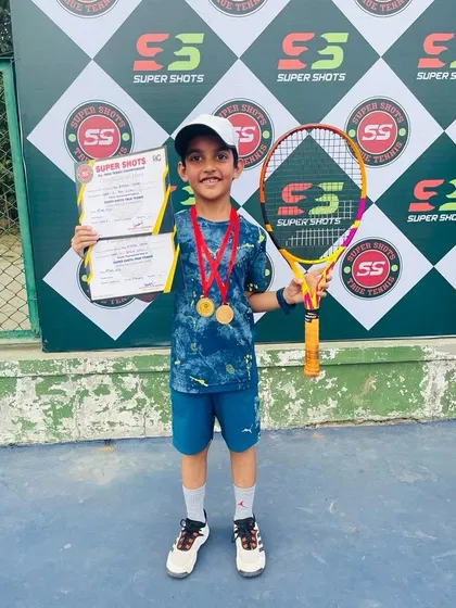 Meet Reyansh Gandhi, a champion in the making. Here he is celebrating his victory in the Under-8 category and a semi-final finish in the U-10s, proving that it's never too early to start a successful tennis journey.
