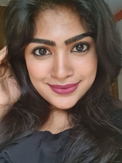 The same party look, showing how it appears from a slightly different angle. The key is clean lines and a lip colour that makes a statement.