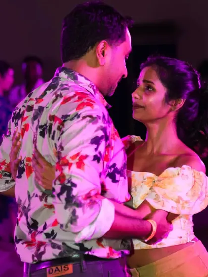 A quiet moment of connection during a dance at GIDC. Even in a crowded room, the music lets you connect one on one.