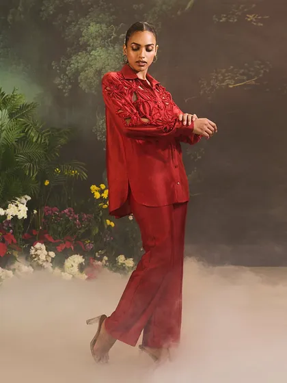 A full-length view of the red Lunara Co-Ord Set, embodying a powerful and modern aesthetic.
