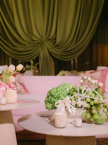 Another view of the lounge area, showing how the soft, ambient lighting from the chandeliers and table lamps created a warm and inviting space for conversation.