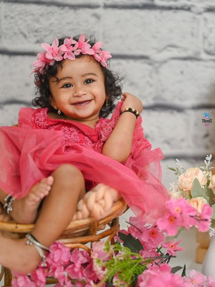 A duplicate of image 16, capturing the pure joy of a one-year-old.