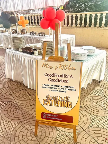 My "Good Food for A Good Mood" sign at a kid's birthday party. This is my motto, and I bring it to life with gourmet catering, party setups, and live stations.