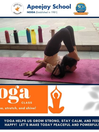 This student showcases remarkable flexibility and control in a complex yoga pose. Our classes help students grow strong, stay calm, and feel happy, making their school day peaceful and powerful.