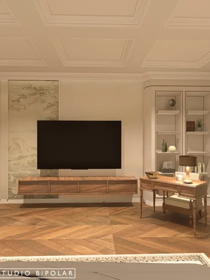 The TV is mounted on a simple wall, flanked by a wallpaper panel and the study nook. The herringbone wooden floor adds warmth and a timeless pattern to the space.