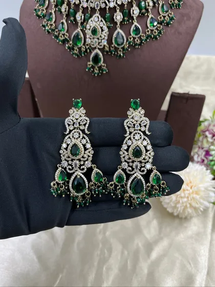 Another angle of the earrings for the green AD zircon choker set.