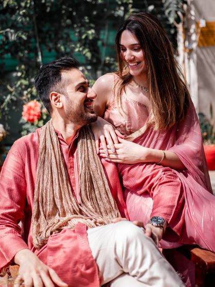 A sun-kissed moment of affection during a pre-wedding shoot. The natural light and genuine smiles make this a timeless portrait of love.