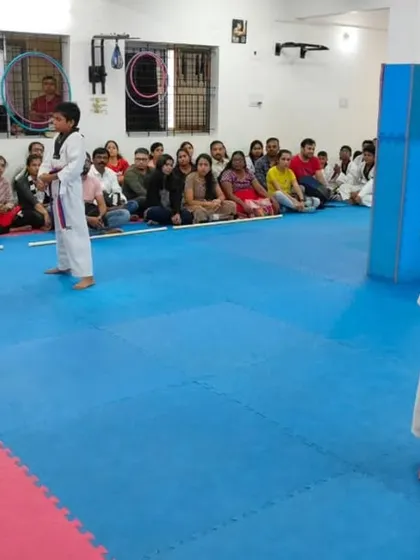 A student stands ready during his belt exam.