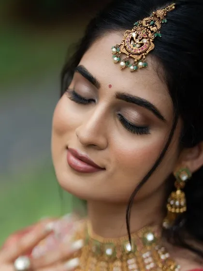 A close-up of the eye makeup, which is soft, neutral, and beautifully blended.