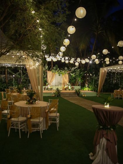 A collection of stunning wedding setups at The Farmhouse Collective. You can see the venue's versatility, from elegant morning ceremonies with floral mandaps to glamorous evening receptions with fairy lights and chic decor. This space is a blank canvas for your dream outdoor wedding in Bengaluru.