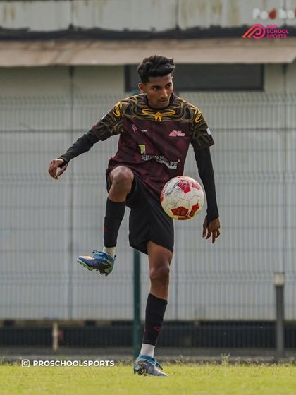 A player shows off their freestyle skills, a moment captured for World Photography Day.