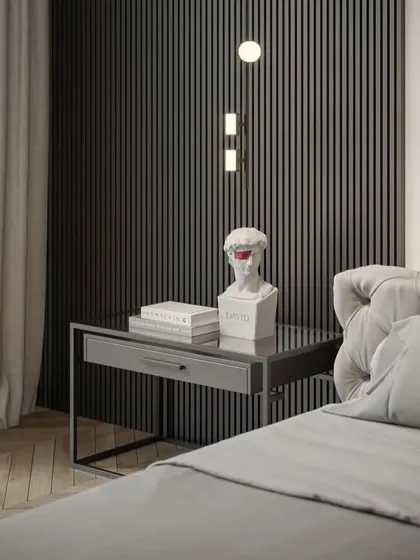 A close-up of the bedside table, showing how we use unique decor pieces to add personality and style to a room.