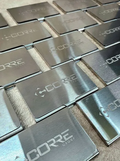 Here’s a bulk order of sleek, stainless steel card holders I did for a corporate group. Engraving a company logo gives them a professional finish, making them an ideal and practical business gift.