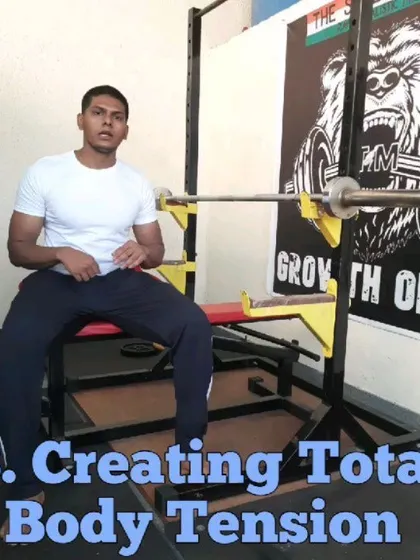 The third point in my bench press analysis: creating total body tension. I teach my athletes how to use their entire body, from their feet to their hands, to create a stable and powerful base for the bench press.