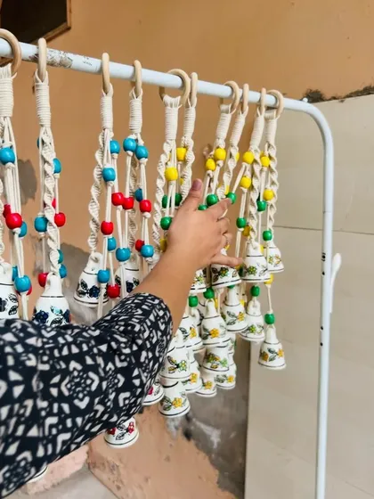 Our team preparing a batch of 'Symphony Chimes'. Available in four colors, these beautiful chimes have sold over 1100 units and are perfect for Diwali decor and gifts for your loved ones.