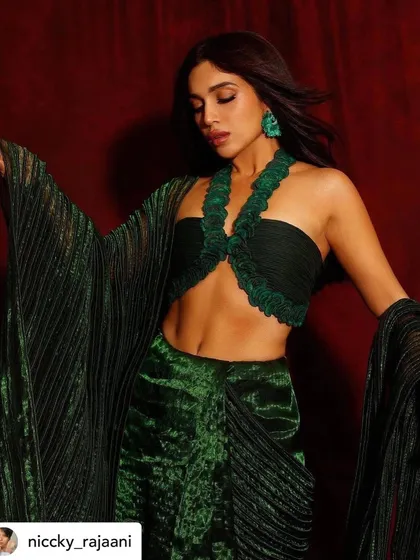 Bhumi Pednekar looking stunning in a green handwoven saree for the MAMI film festival. The makeup is earthy and warm, enhancing her features without competing with the unique texture of the outfit.