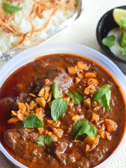 A beautiful meal from my Iftar Box offering, featuring a rich curry served with fragrant rice. During Ramadan, I love curating these special meal boxes filled with comforting kebabs, curries, and biryanis.