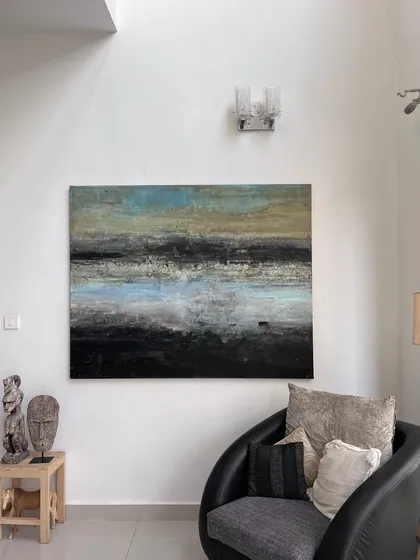Because our gallery is also our home, you'll find art integrated into cozy, personal settings. This abstract piece, "Don’t Hold the Thought," is displayed in a living area to show how a masterpiece can transform an everyday space.