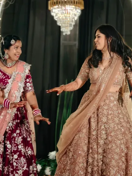 The joy on their faces says it all. This mother and daughter are having the time of their lives during their specially choreographed sangeet performance.