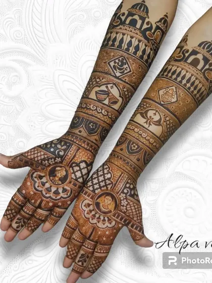 This design incorporates various wedding symbols like a dhol, kalash, and 'gathbandhan' into a full bridal layout.