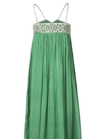 The back view of the green maxi dress, detailing the strap design and the gathering at the waist. Providing multiple angles is key for e-commerce success.