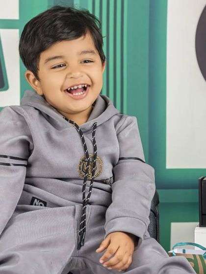 Another shot from the Starbucks theme, this time with a big, toothy grin. He's clearly a happy customer.