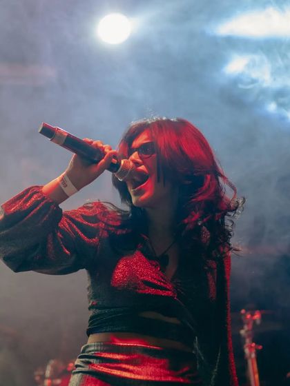 Another intense performance shot from the TS Collective show at Fandom. The lighting and my expression convey the power and emotion of my original music.