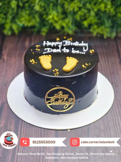 A sweet chocolate cake for a "Dad to be". The tiny golden feet are an adorable way to celebrate the exciting journey into fatherhood.