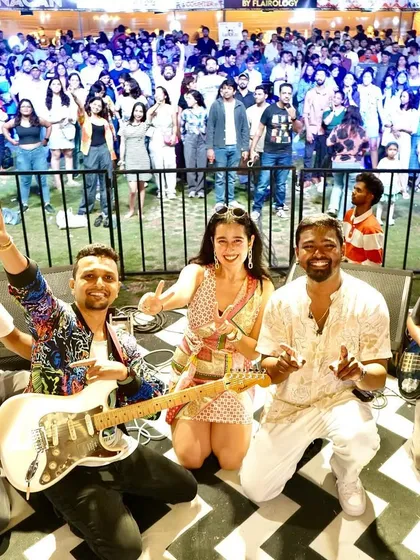 This is us, The Sarah Collective, with our amazing audience at The Wassup Flea. Seeing a sea of happy faces is the ultimate reward for any musician.