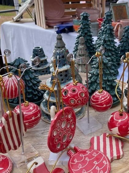 My Christmas collection is always a highlight at winter markets. The bright red and green ornaments and ceramic trees bring so much festive cheer to my stall.