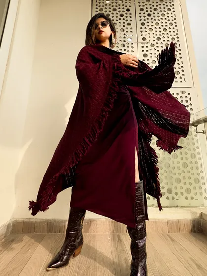 Another shot showing the beautiful movement of the poncho. It's like having wings!