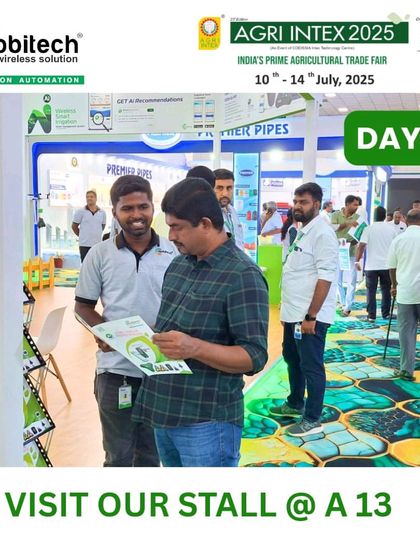 A visitor reviewing our product catalog at the Agri Intex stall.