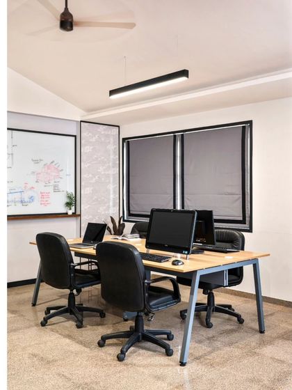 These images provide further views and details of the Project Rooftop and Noir Oak offices. They showcase everything from conference room details and corridor views to custom furniture and the play of natural light, illustrating my comprehensive approach to workspace design.