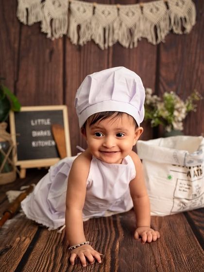 A happy crawl from the chef. Capturing babies on the move adds a sense of life and energy to the photos.