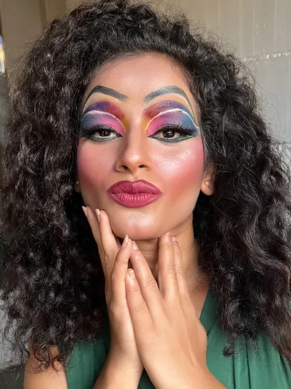 Another powerful pose showing off the stunning drag makeup artistry.