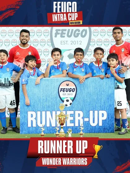 The U-9 Runner-Up team, 'Wonder Warriors', proudly posing with their trophies.