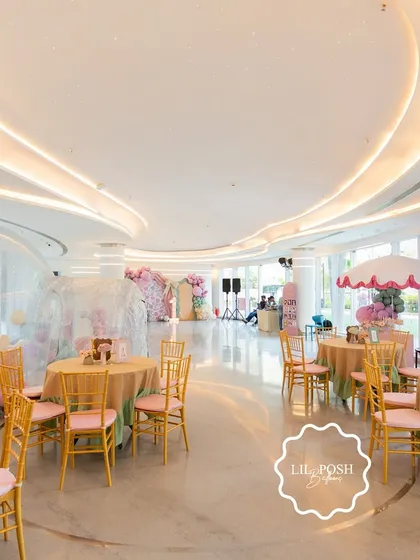 An overview of the spacious and light-filled venue for "Aahana's Onderland," showing how the pastel decor transformed the entire room into a whimsical playground.