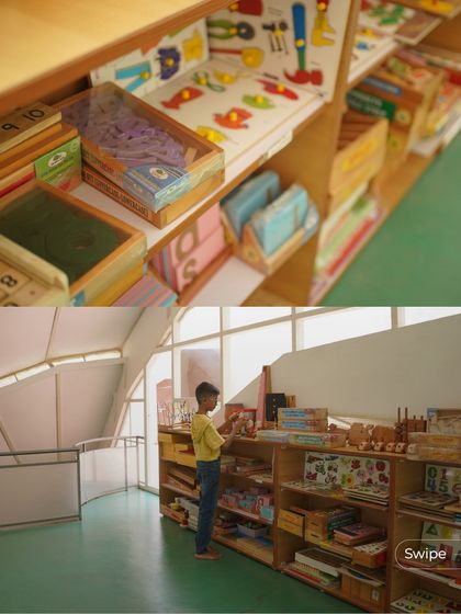The classrooms are filled with Montessori learning materials neatly organized on low, open shelves. The design ensures that the tools for learning are always within reach, fostering independence and exploration.
