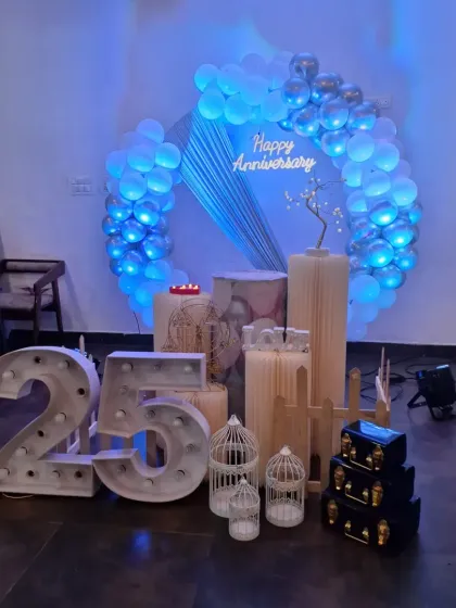 The cool blue lighting gives this 25th-anniversary decoration a serene and magical feel.