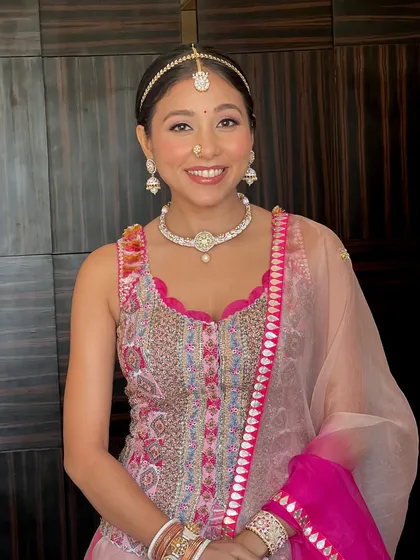 A close-up of Yogini's daytime look. We kept the skin looking natural and radiant, with a soft pink lip and defined brows.