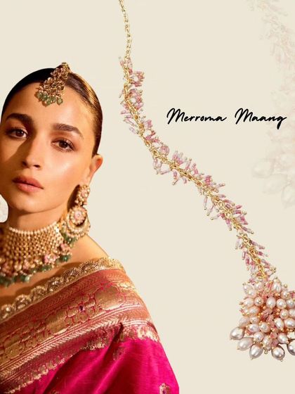 Inspired by Alia Bhatt's iconic bridal look, our Merrena Maang Tikka is handcrafted with delicate pink and pearl details. It's the perfect piece to add a touch of celebrity glamour to your own special day.