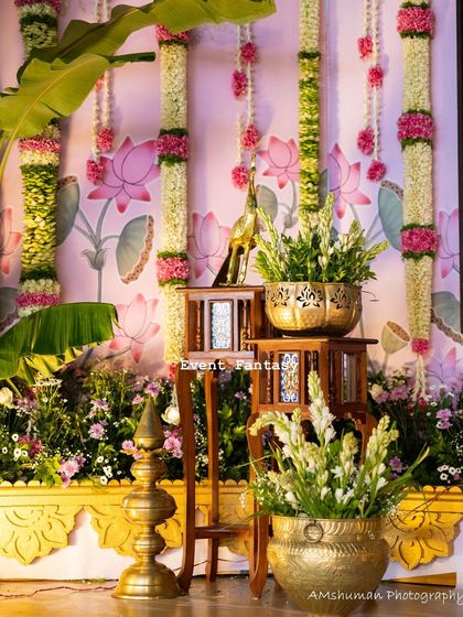 A detail shot of the floral and brass arrangements. I use fresh tuberoses, lotus buds, and brass urlis to create decor that is both visually stunning and culturally significant for your namkaran.