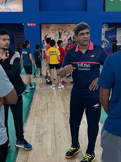 Learning directly from a legend. Prakash Padukone provides invaluable, firsthand insights to our coaches during a training session, sharing the strategic thinking and technical wisdom that made him a world champion.