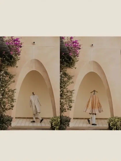 A creative diptych of the bride's and groom's outfits hanging in the same archway, symbolizing their two lives becoming one.