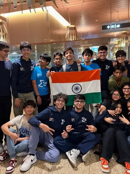Houston bound! Team Sigma 9692 at the airport, ready to fly to the World Championship for their second consecutive year. The Indian flag shows their national pride.
