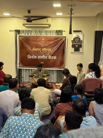 The unique atmosphere of an intimate home concert, or 'baithak'. I am accompanying santoor player Ninad Daithankar here. In these settings, the connection between the artists and the listeners is immediate and powerful.