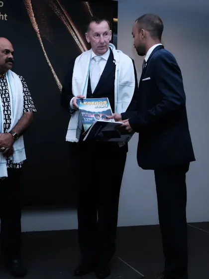 Presenting a token of appreciation to an international grandmaster. These moments are about honoring the lineage and wisdom of those who have paved the way in Taekwon-Do.